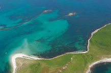 Aerial photograph of submerged stone field boundaries on Samson Flats, Isles of Scilly. 
Photo credit: Historic England Archive